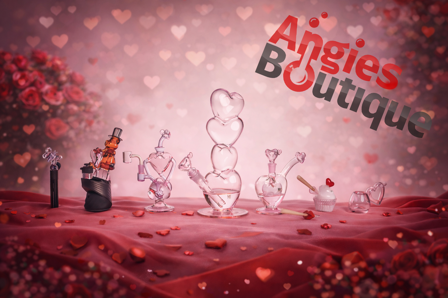 Valentine’s Day heart-themed glass collection featuring MJ Arsenal bubblers and dab rigs arranged on a romantic red backdrop at Angies Boutique