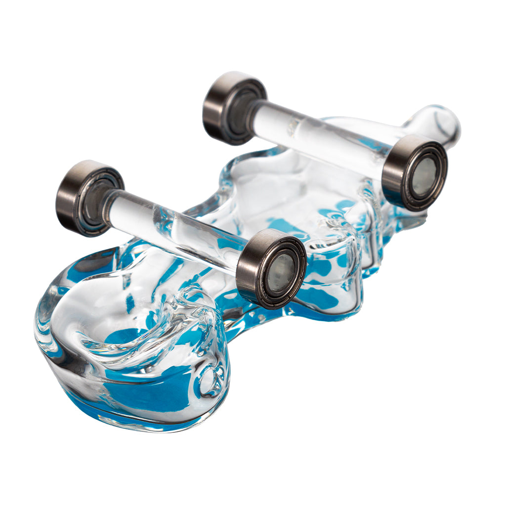 Cookies Toke Deck clear skateboard-shaped hand pipe with functional wheels and single hole push bowl bottom view