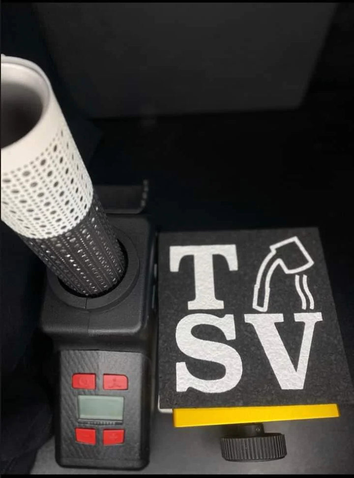 Top view of Terp Sous Vide torch and TSV mat on gold lift, highlighting digital controls and compact design for dabbing accuracy.