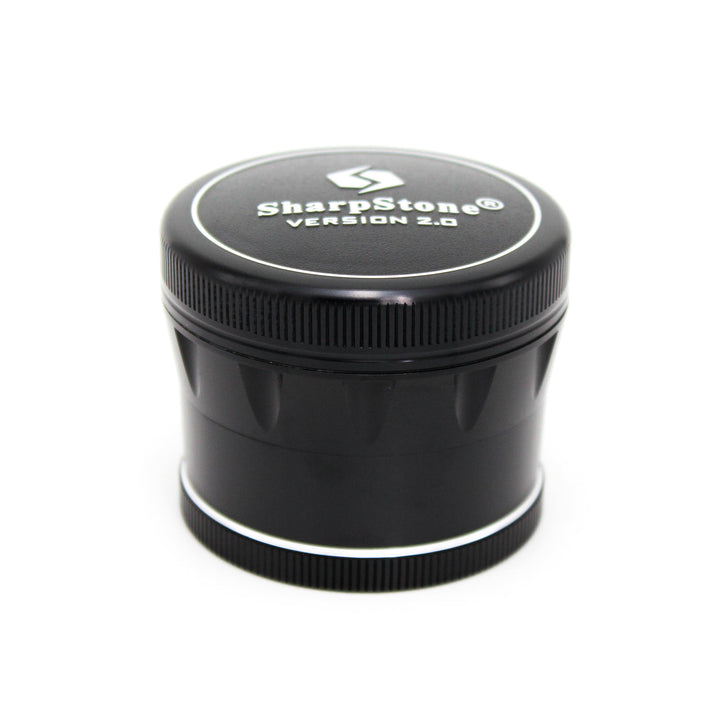 Sharpstone V2 4 Piece 2.5" Grinder in Black — disassembled view showing all four pieces, diamond grinding teeth and stainless steel pollen screen