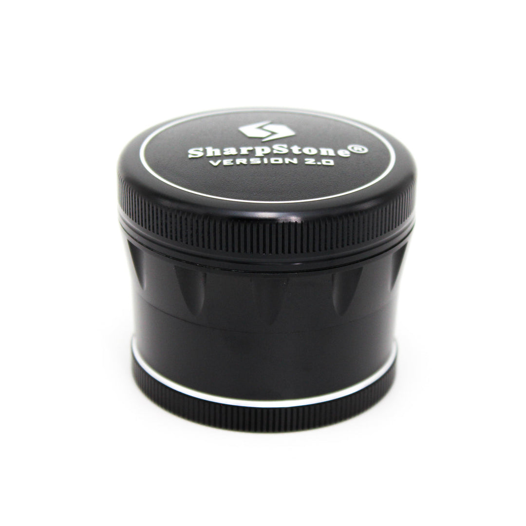 Sharpstone V2 4 Piece 2.5" Grinder in Black — disassembled view showing all four pieces, diamond grinding teeth and stainless steel pollen screen