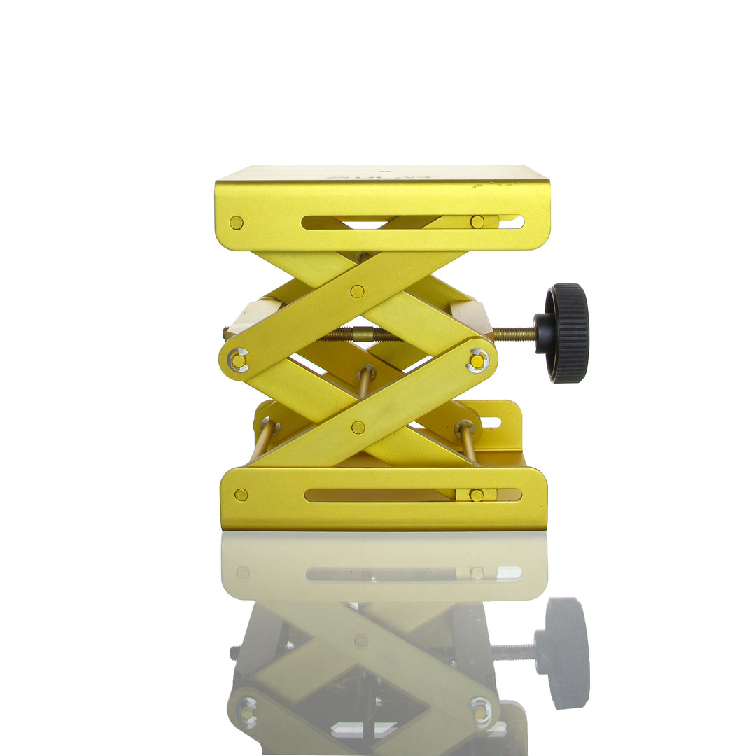 Gold adjustable scissor lift platform from the Terp Sous Vide - Complete Kit, used to support dab rigs at optimal height.