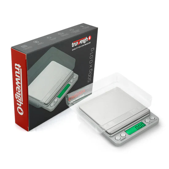 truweigh enigma digital scale packaging with scale and accessories shown