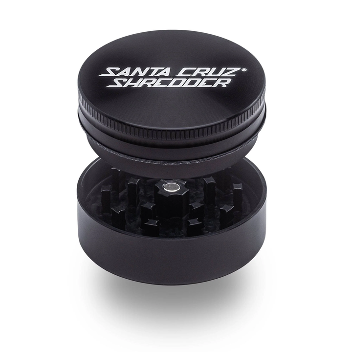Black Santa Cruz Shredder 2-Piece Medium Grinder – magnetic lid open showing sharp teeth and matte finish.