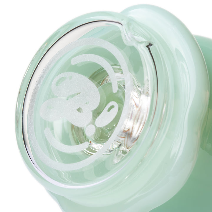 Close-up of the base of the BigFun! Ice Cream Peak Top showing the base-connected perc that filters the draw through water