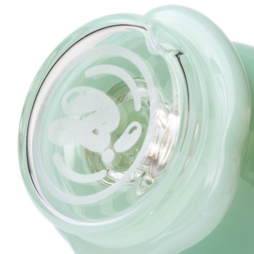 Close-up of the base of the BigFun! Ice Cream Peak Top showing the base-connected perc that filters the draw through water