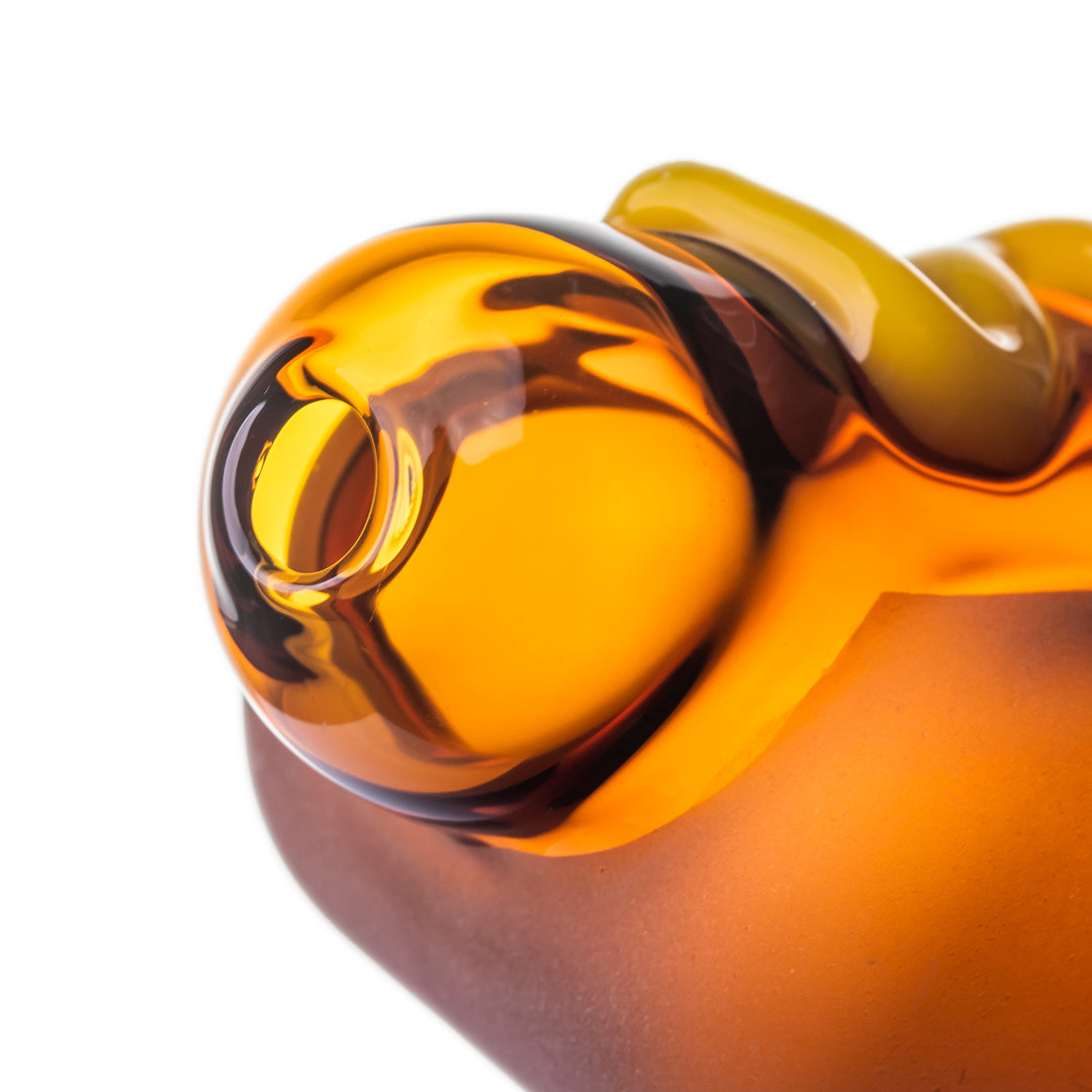 Close-up of the BigFun! Glizzy Hand Pipe mouthpiece showing the borosilicate wall thickness