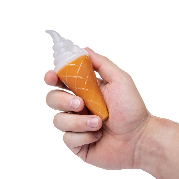 BigFun! Ice Cream Hand Pipe in Vanilla held in a hand for scale, showing how the tapered cone seats in the palm