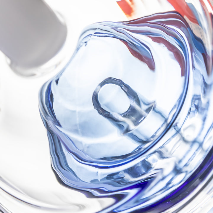 Detail of the base-connected perc inside the BigFun! Sip N Rip Peak Top, the feature that filters the draw through water