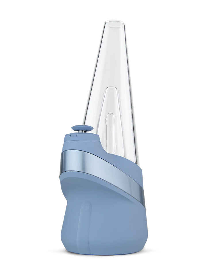 Puffco Peak Vaporizer in Sky – soft blue base with conical glass top, angled hero view.