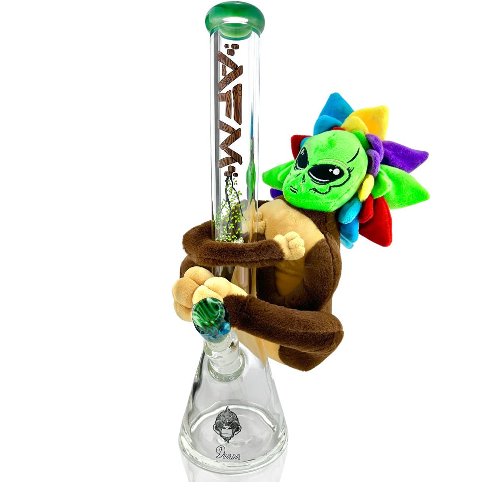AFM 18" Beaker - 9mm Beaker with green-accented mouthpiece and base, featuring a colorful alien-monkey plush toy wrapped around the neck.