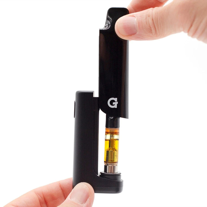 G Pen Hydout 510 Battery – open magnetic cover revealing inserted 510 cartridge connection.