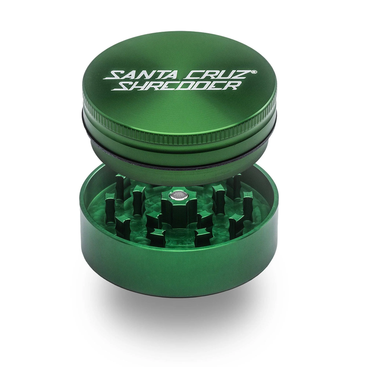 Green Santa Cruz Shredder 2-Piece Medium Grinder – durable aluminum body with sharp teeth and secure lid.