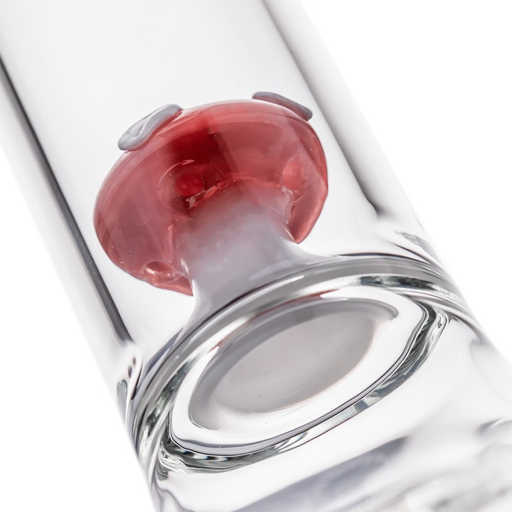 Detailed view of the upper red mushroom percolator inside the MJ Arsenal - Lovecap Water Pipe, showcasing its vibrant color and craftsmanship.