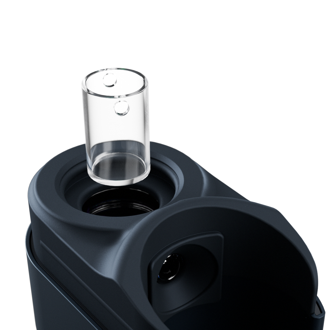 Dr. Dabber Switch Go 14mm pure quartz insert close-up inside titanium chamber.