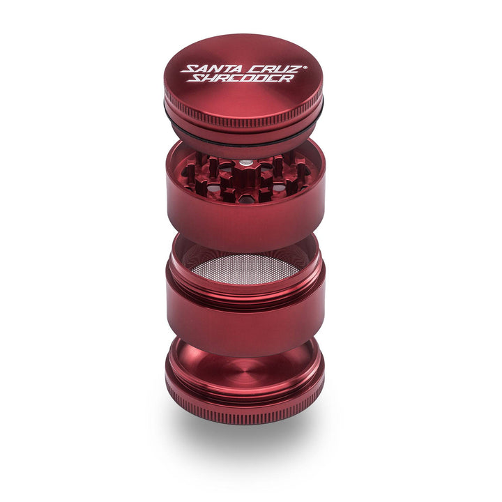 Red Santa Cruz Shredder 4-Piece Medium Grinder highlighting sharp teeth and polished finish.