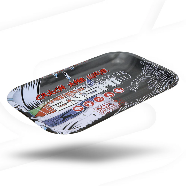Close-up of Elements Zushi Catch The Wave metal rolling tray floating