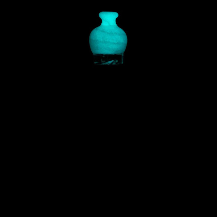 Empire Glassworks bulb pivot top glow in the dark glass illuminated under low light