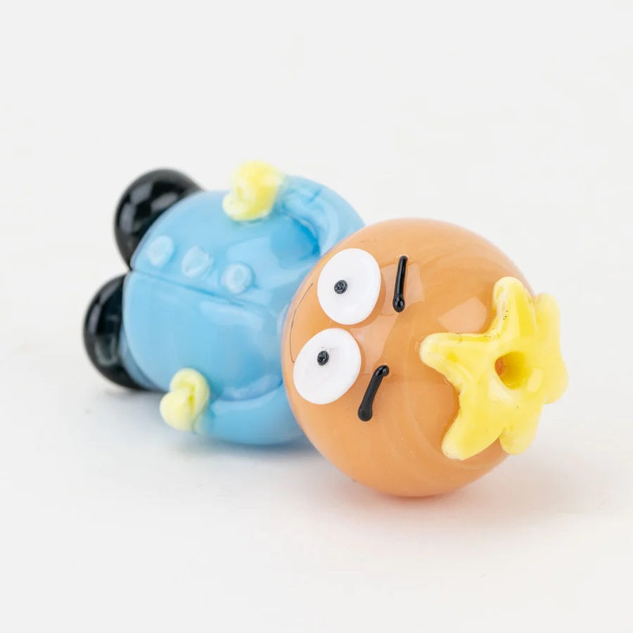 Empire Glassworks Margarine Man Pipe — Butters-inspired South Park glass hand pipe, top view of push bowl and carb