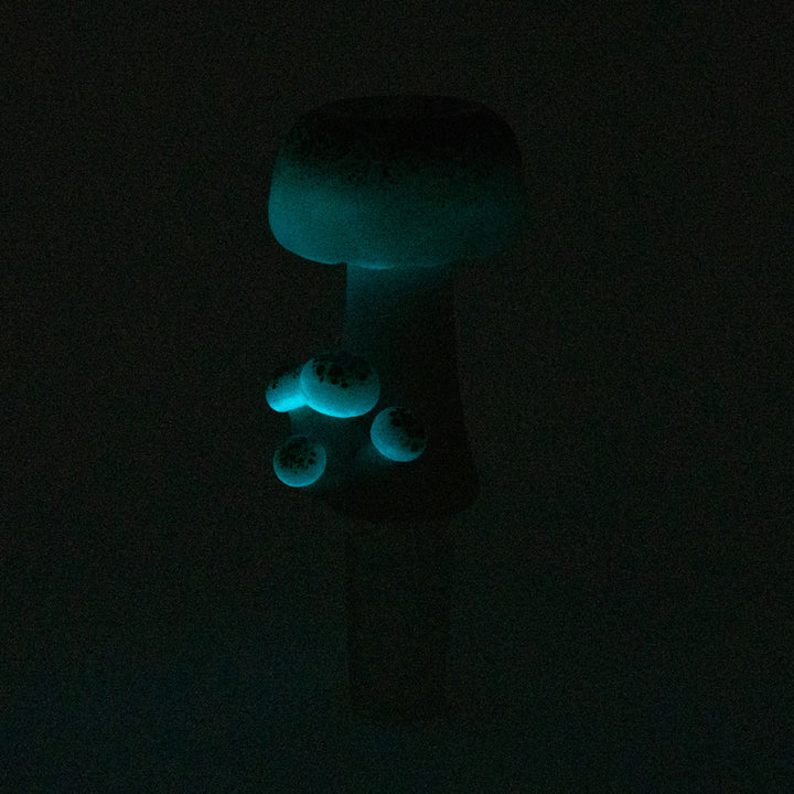 Empire Glassworks Mushroom Glow Slide 14mm glowing blue-green in the dark – cap, stem and baby mushrooms lit