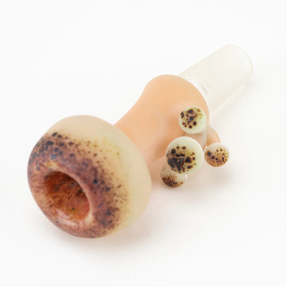 Empire Glassworks Mushroom Glow Slide 14mm lying on its side – speckled cap bowl and frosted 14mm male joint
