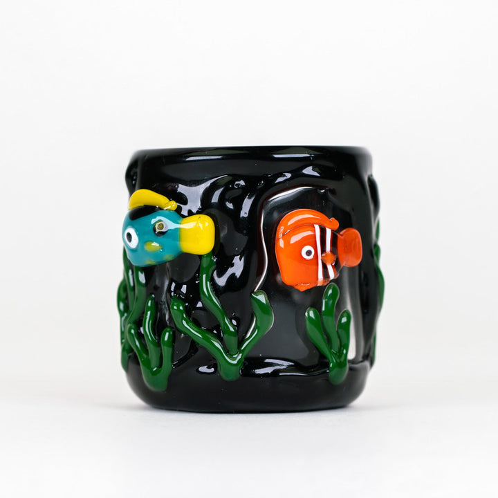 Empire Glassworks Under The Sea Puffco Proxy Core Attachment, glass on its own, showing the clownfish and seaweed over black glass.
