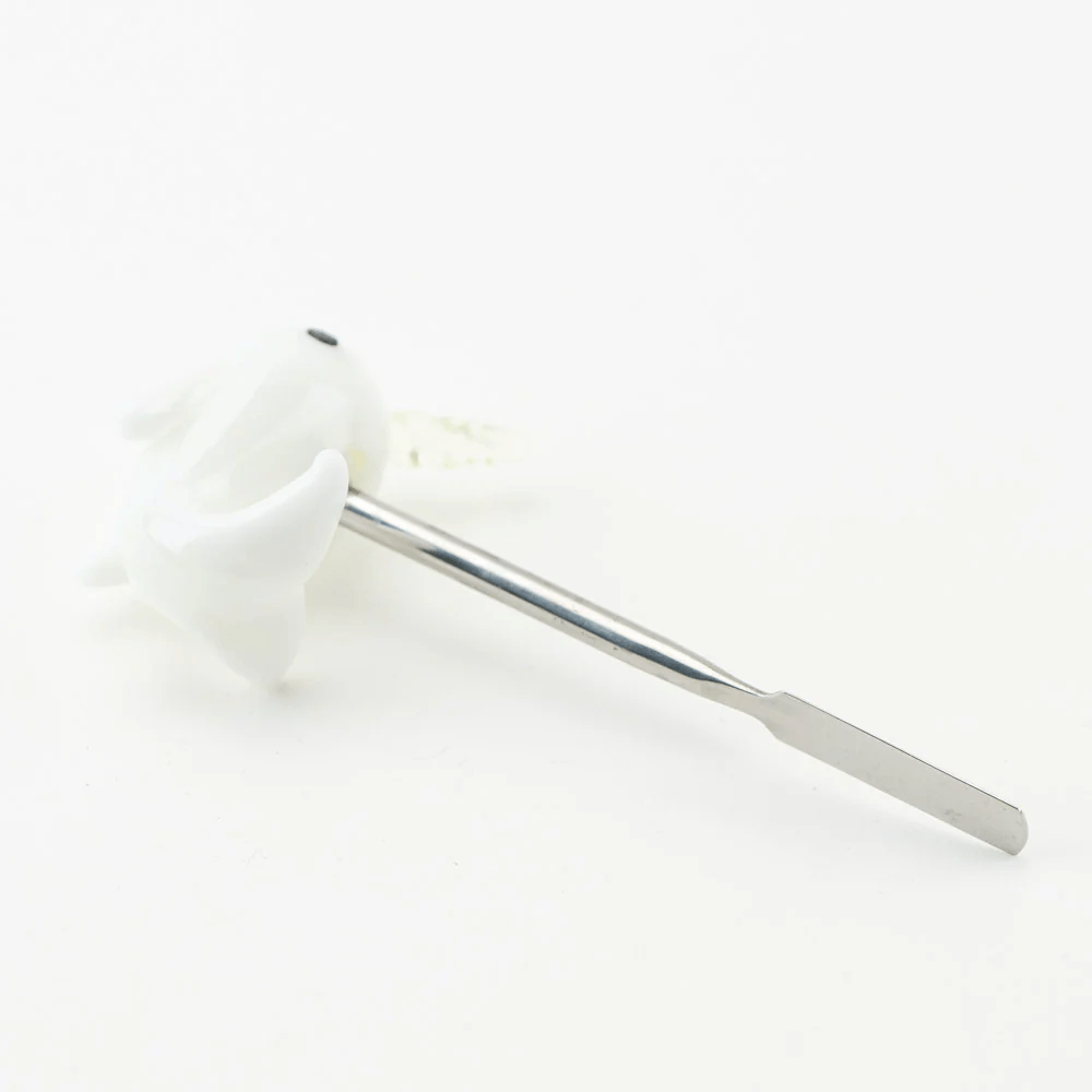 Empire Glassworks Radioactive Narwhal Dabber — glowing narwhal glass dabber tool, side profile