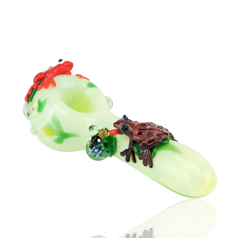Empire Glassworks Ribbit Small Spoon Pipe, 4.5" pale lime borosilicate with a red toad and a dark brown toad on green lilypads, an implosion marble and a sculpted insect