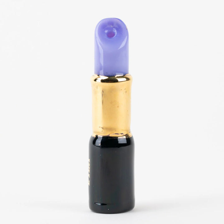Collectible glass lipstick pipe collaboration between Empire Glassworks and Sakibomb