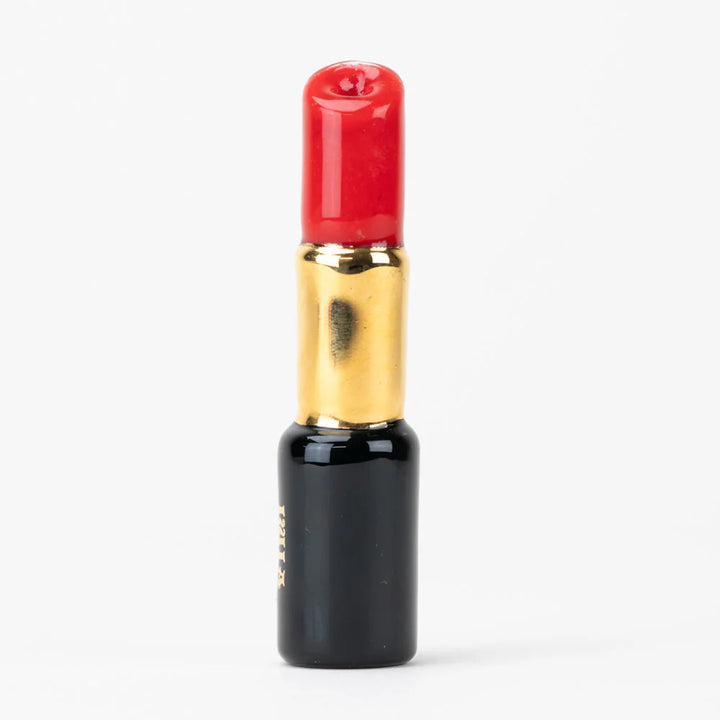 Close-up of Sakibomb Lipstick Pipe with realistic lipstick detailing