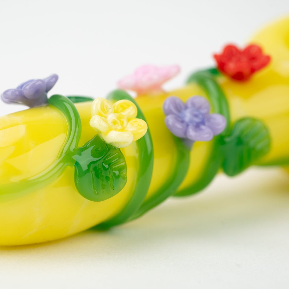 Empire Glassworks Sunshine Garden Pipe Small flower detail – lavender, pink, pale yellow and red blooms along the vines