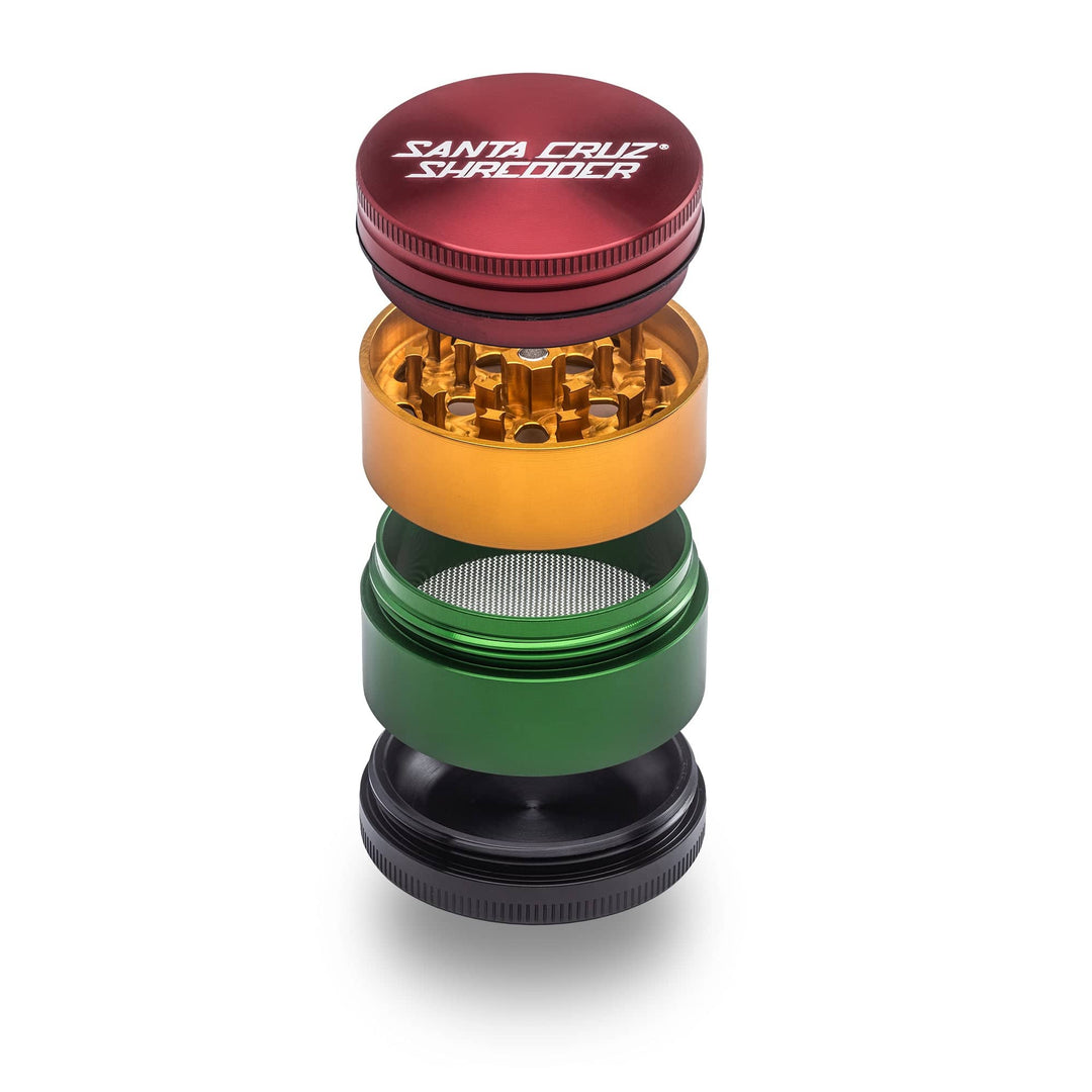 Rasta Santa Cruz Shredder 4-Piece Medium Grinder in red, yellow, green gradient.