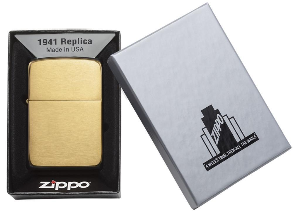 Zippo - 1941 Replica Brushed Brass Lighter in original box with windproof design and refillable feature, made in USA with lifetime guarantee.