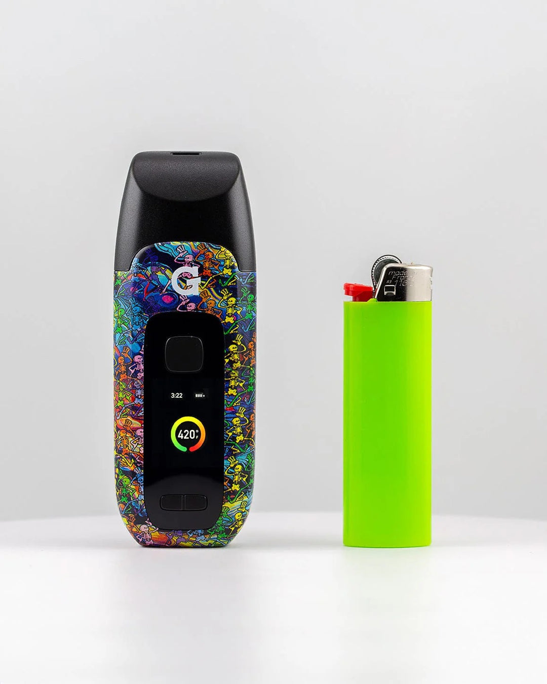 G Pen Dash+ Grateful Dead – unit standing next to Bic lighter for size comparison.