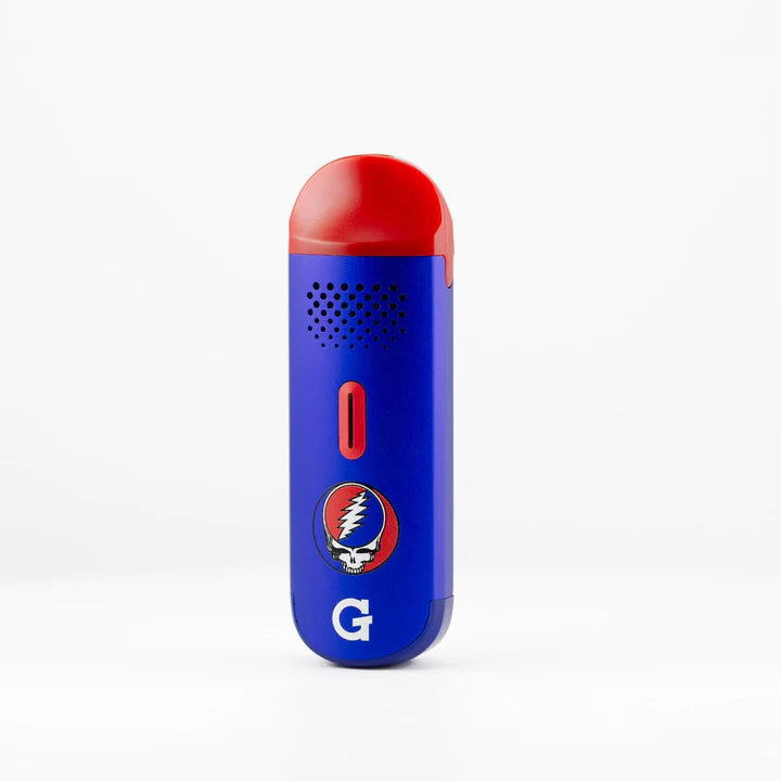 G Pen Dash Grateful Dead – angled view highlighting blue shell and compact herb vape form factor.