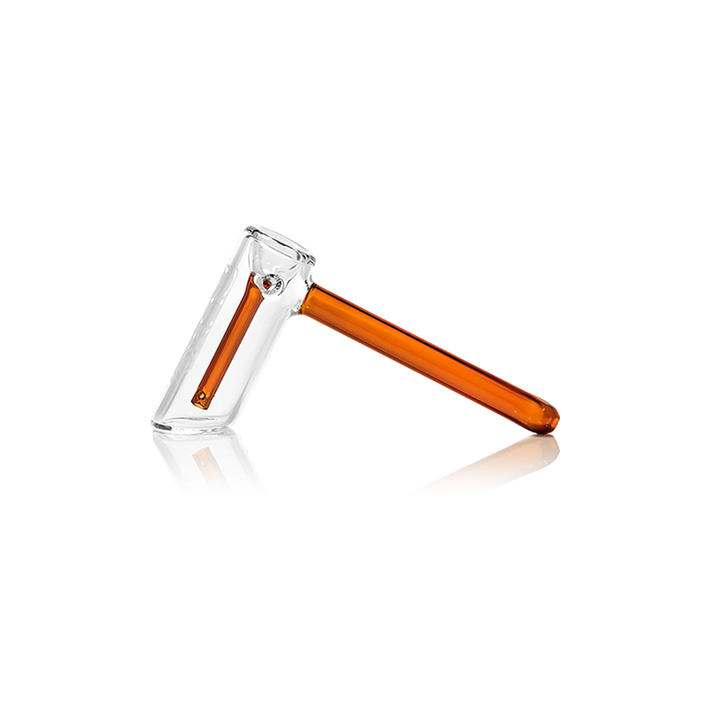 GRAV Mini Hammer Bubbler in amber glass with two-hole fission downstem, side view.