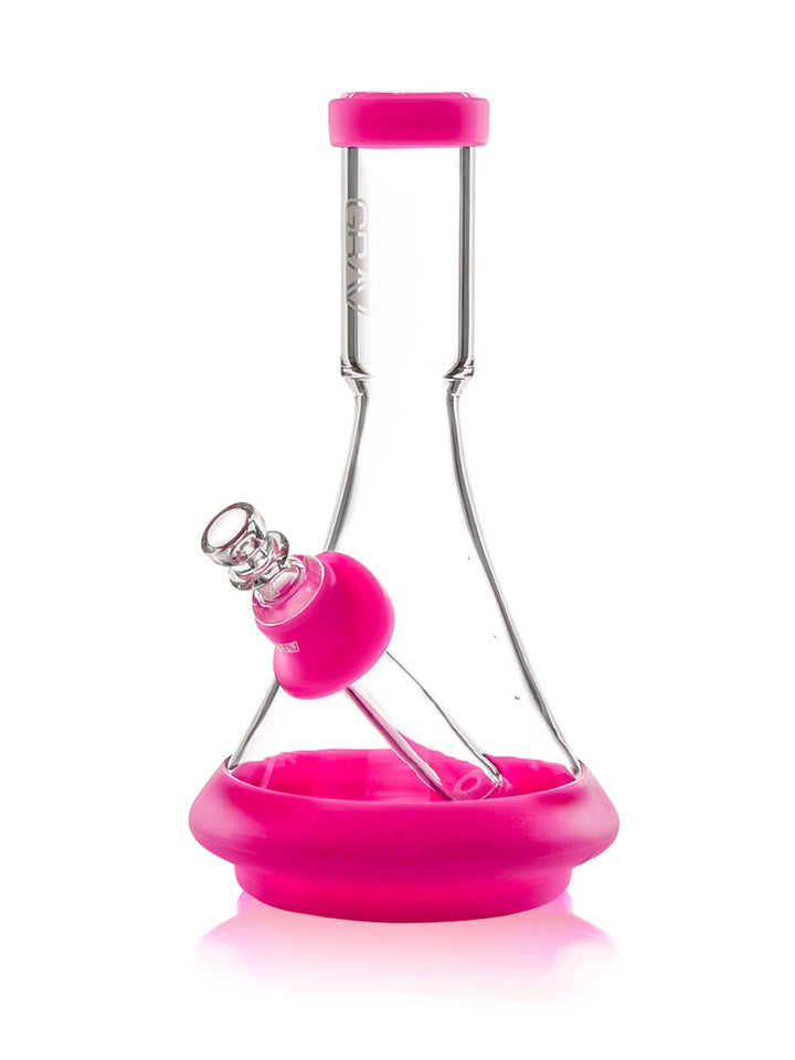 GRAV Deco Beaker in Silicone in Toxic Pink, glass beaker bong with pink silicone armor.