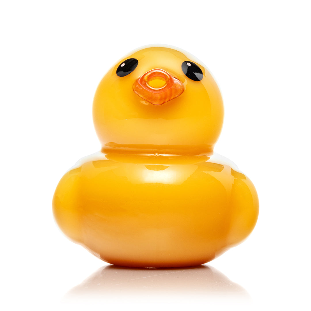 Hemper Ducky Hand Pipe front view, with the decal eyes and the orange glass beak that serves as the mouthpiece
