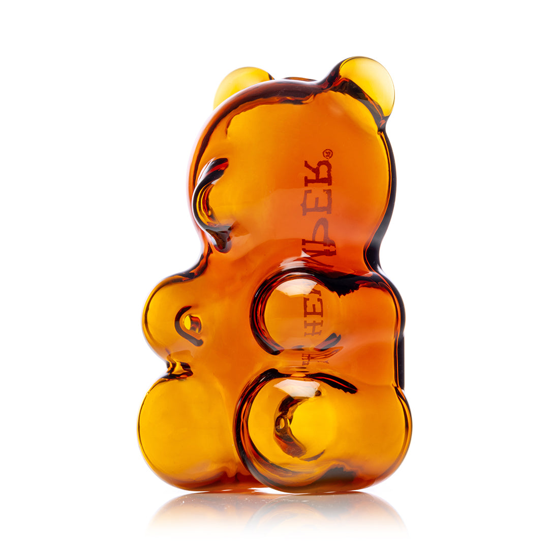 Hemper Gummy Bear Hand Pipe – front view angled to the left, amber glass body.