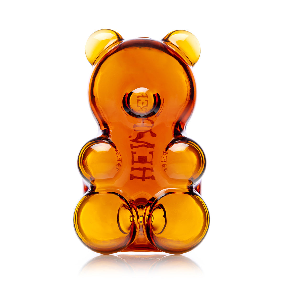 Hemper Gummy Bear Hand Pipe – 3.6 inch transparent amber glass bear pipe, front view.