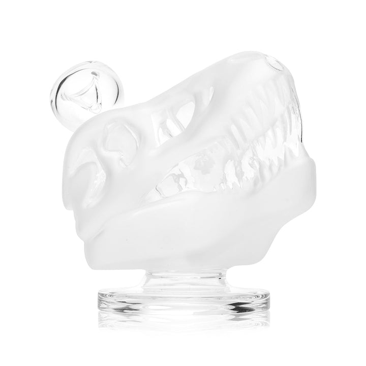 Hemper Jurassic Spark Dinosaur Skull bong at an angle with the round glass bowl