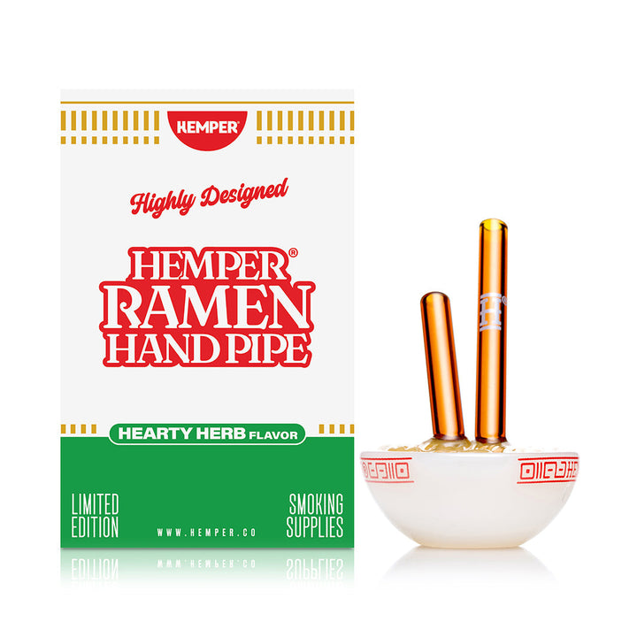 Hemper Ramen Bowl hand pipe beside its Hearty Herb Flavor retail box