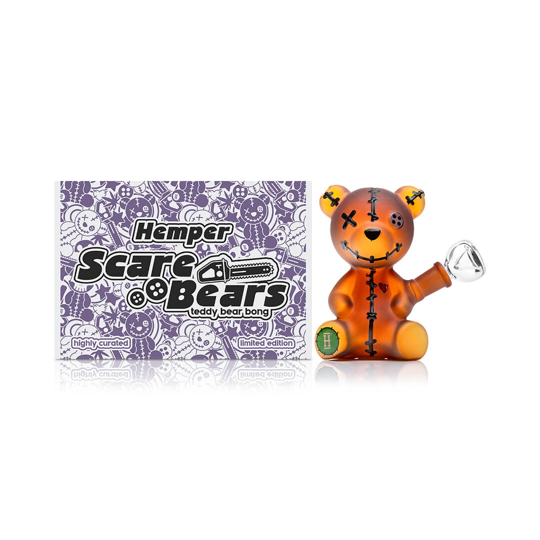 Hemper Scare Bears Teddy Bear bong beside its limited edition retail packaging
