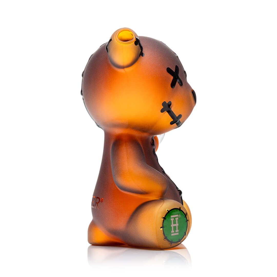 Hemper Scare Bears Teddy Bear bong from the side showing the seated pose