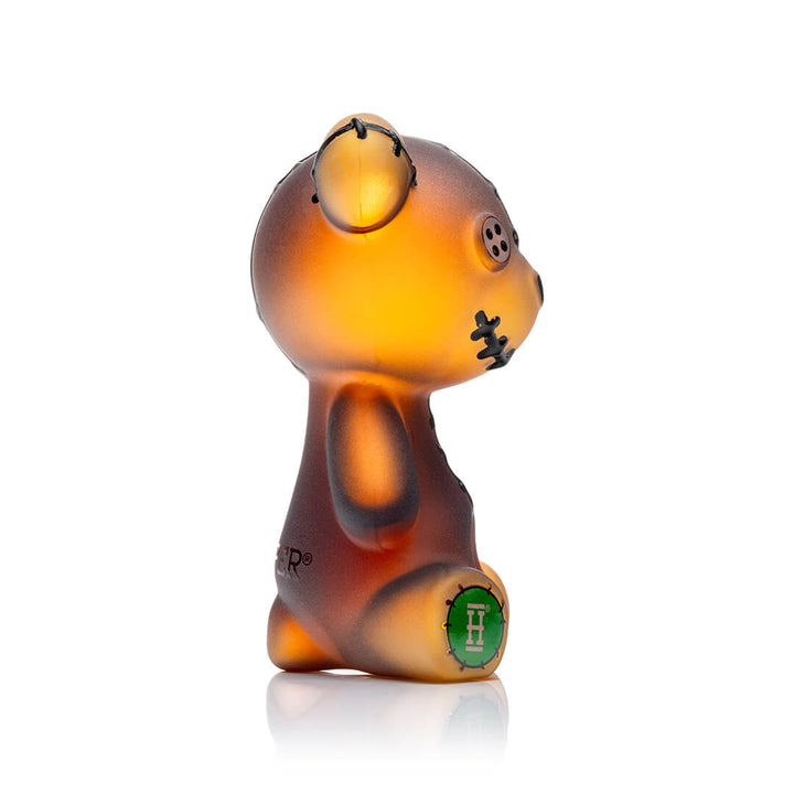 Hemper Scare Bears Teddy Bear hand pipe from the side showing the seated pose