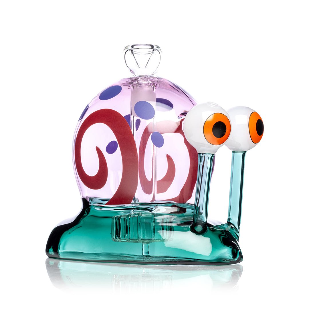 Hemper Snail XL bong with a pink swirled shell, teal body and orange glass eyes