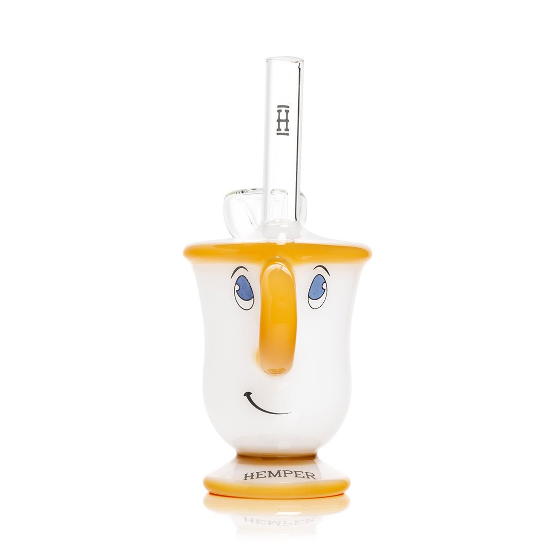 Hemper Tea Cup bong in three quarter view on its yellow glass foot