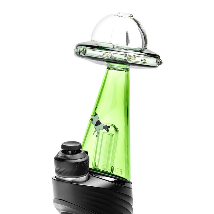 Hemper UFO Vortex Peak Top fitted onto a Puffco Peak device, viewed from the top left, showing how the attachment sits in use