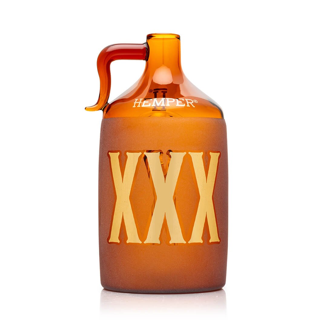 Hemper Wild West Moonshine bong, amber glass jug with a gold XXX label and handle