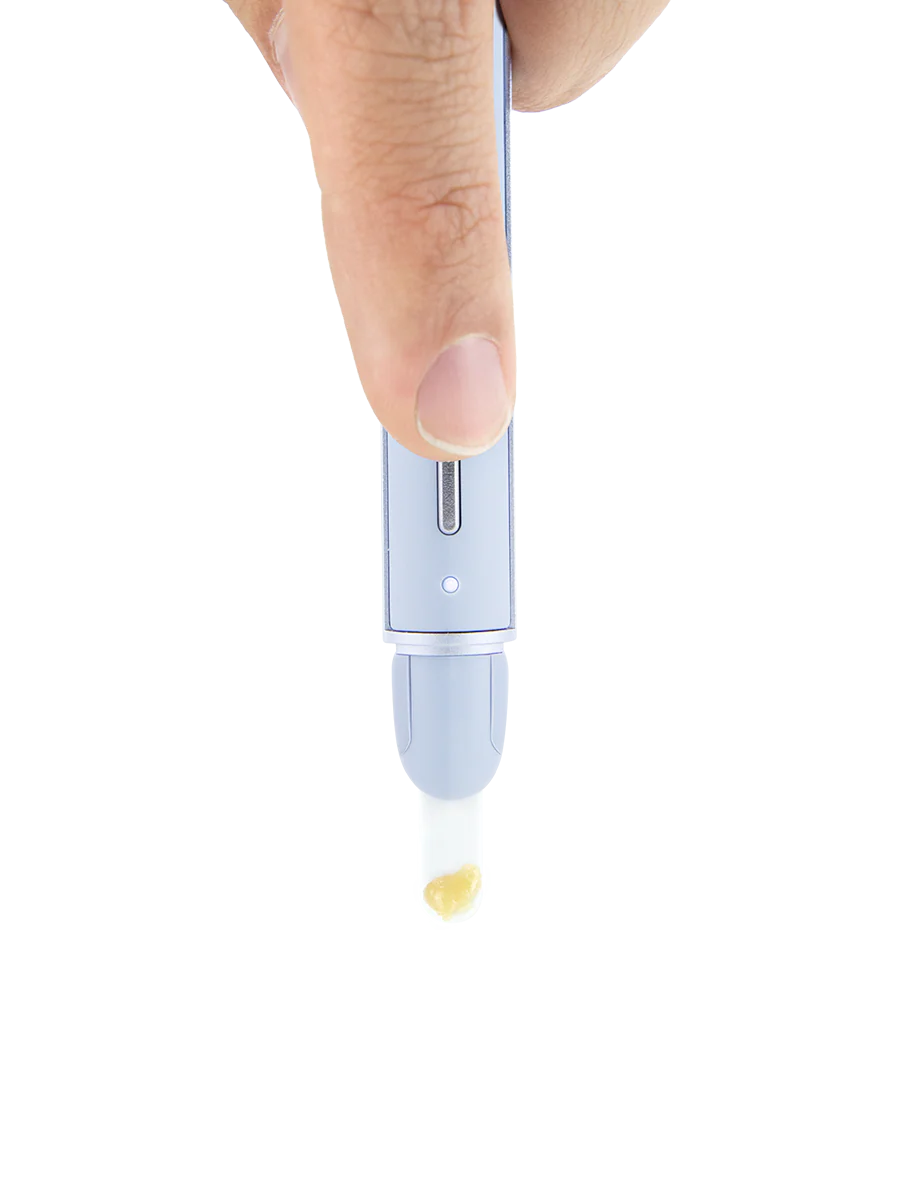 Puffco Hot Knife pearl in use dropping concentrate cleanly from heated tip